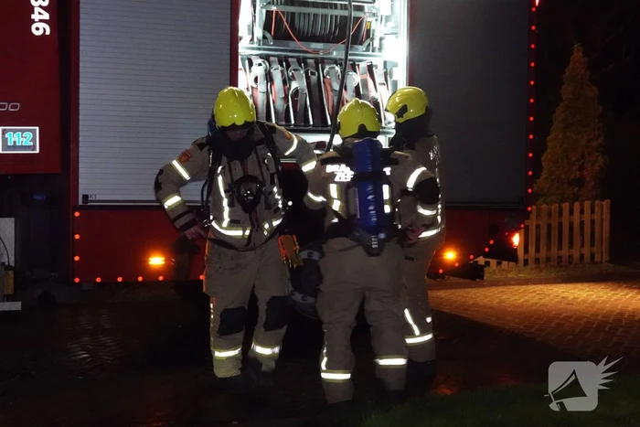 Felle brand in coniferenhaag