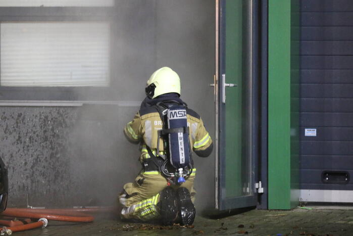 Uitslaande brand in bedrijfspand