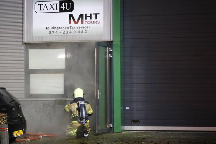 Uitslaande brand in bedrijfspand