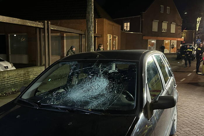 Automobilist en voetganger in botsing