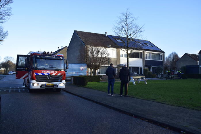Gordijnen vatten vlam in woning