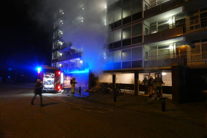 Rook in flat wegens afvalbrand