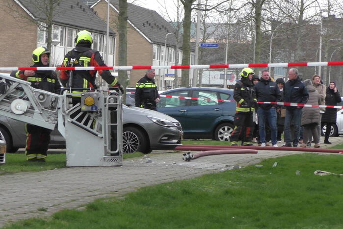 Gevel flatwoning ontzet door explosie