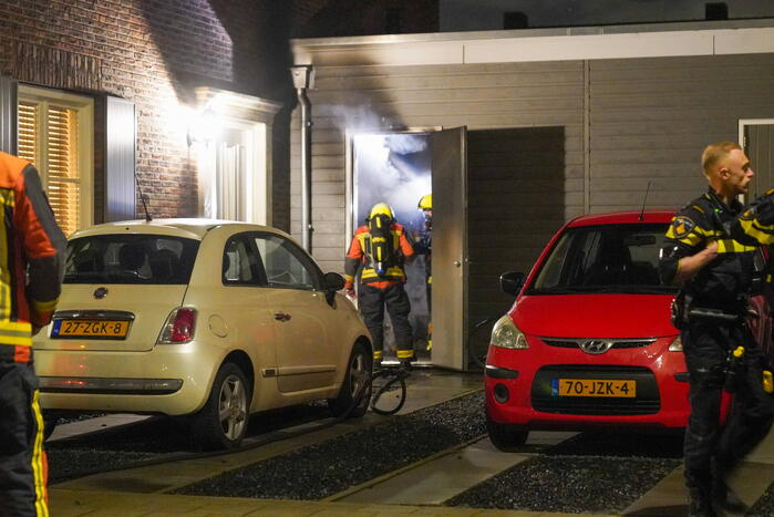 Brand in een schuur naast de woning
