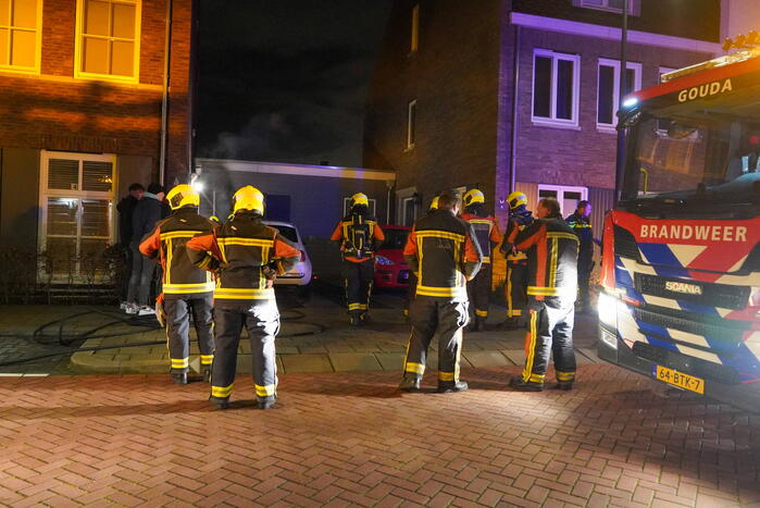 Brand in een schuur naast de woning
