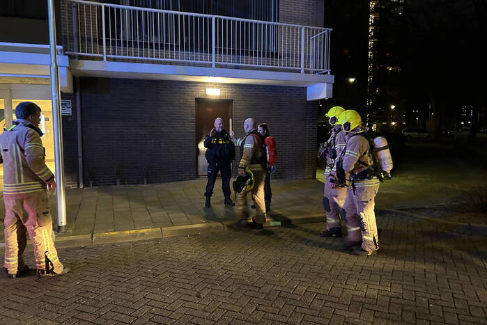 Brand in keuken van flatwoning