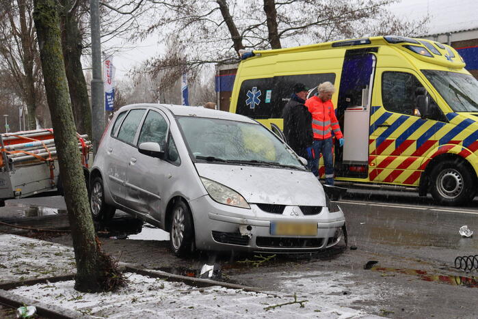 Forse schade en wiel afgebroken na botsing
