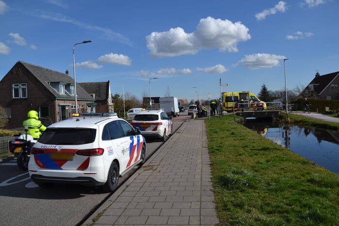 Fietser geschept door bestelbus