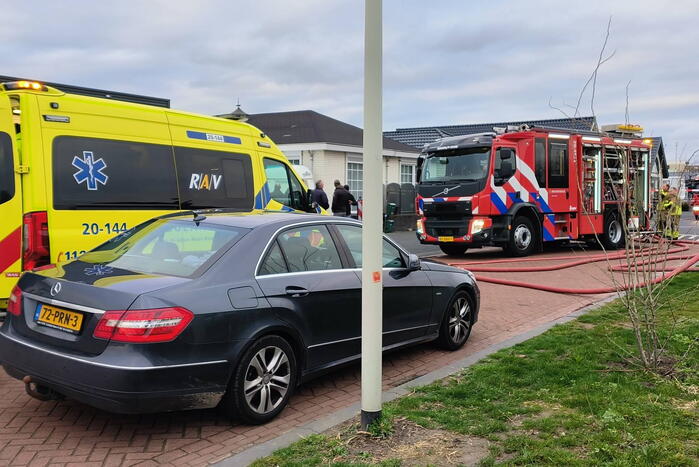 Zwaargewonde na woningbrand