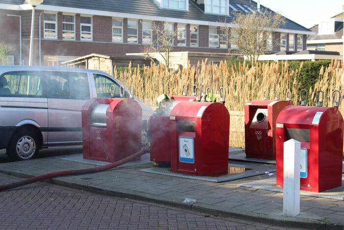 Brand in ondergrondse papiercontainer
