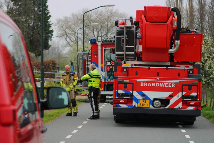 Brand in woning met rietendak