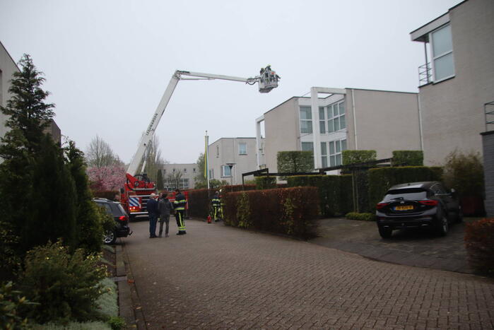 Schoorsteen geveegd na brand