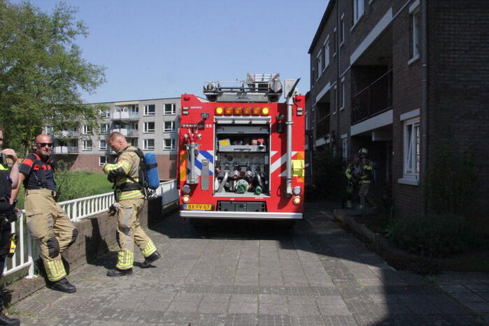 Pan op kookplaat vat vlam