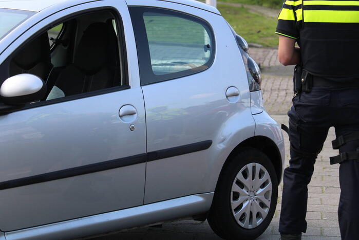 Scootmobieler omgeslagen na aanrijding met auto