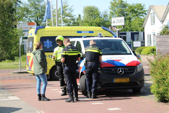 Scootmobieler omgeslagen na aanrijding met auto