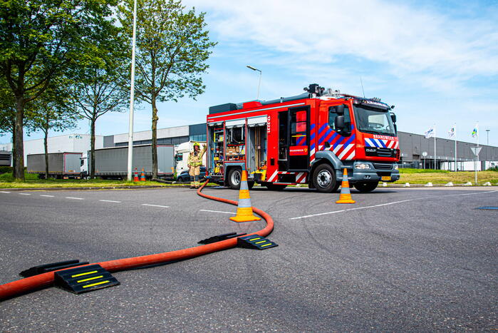 Brand in perscontainer met papier