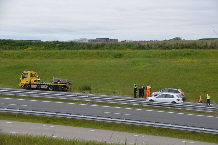Auto met aanhanger geschaard