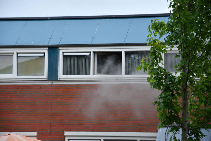 Hevige rookontwikkeling bij uitslaande brand