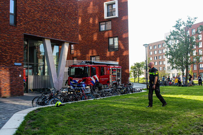 Brand in woning op achtste etage