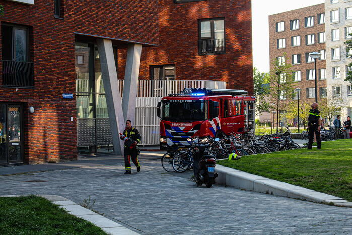 Brand in woning op achtste etage