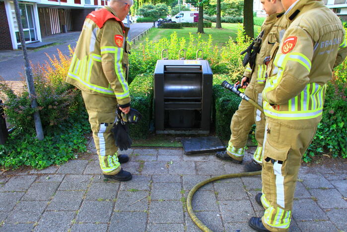 Ondergrondse container vat vlam