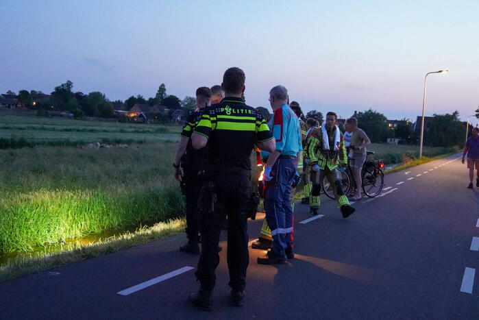 Fiets ligt dagenlang in water
