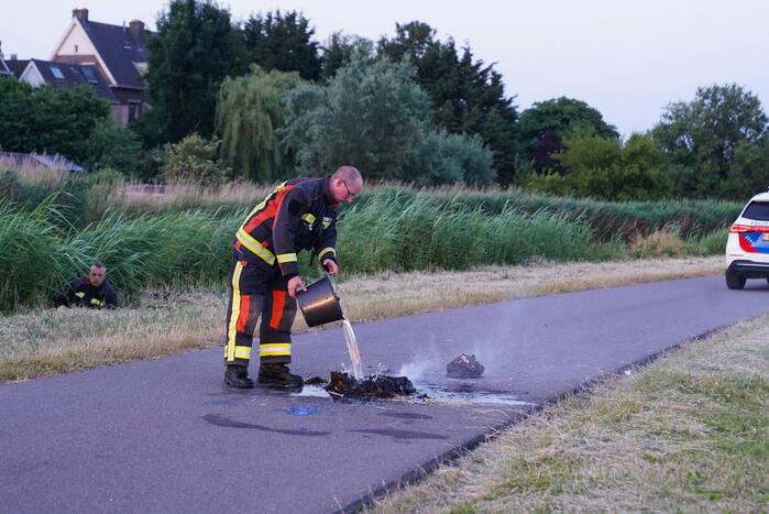 Afval in brand snel geblust