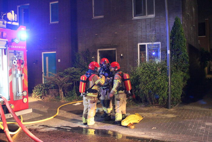 Buurman ontdekt brand in woning