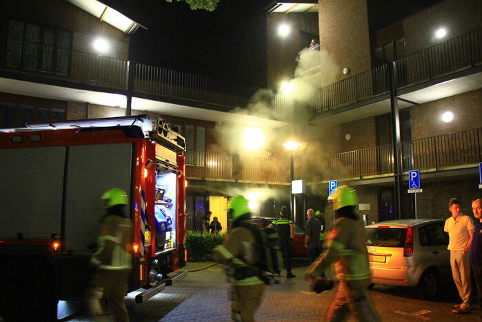 Scootmobiel en elektrische fiets vatten vlam in woning