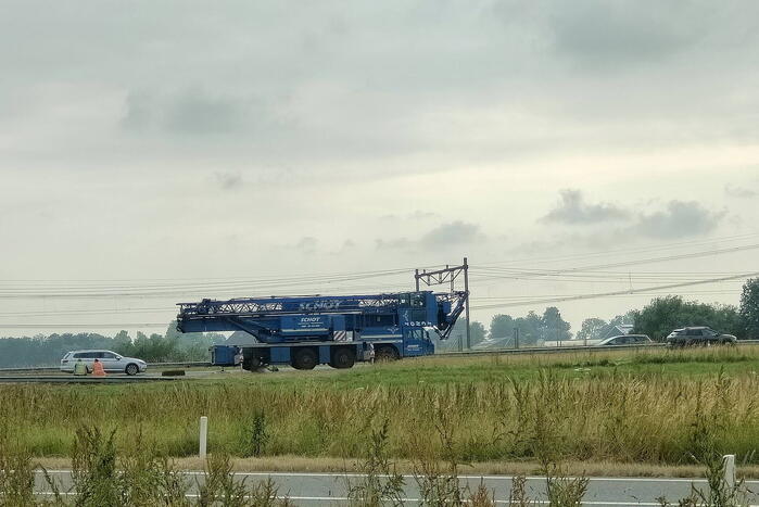 File na stilgevallen kraanwagen