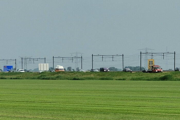 File na stilgevallen kraanwagen