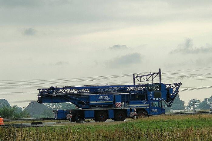 File na stilgevallen kraanwagen