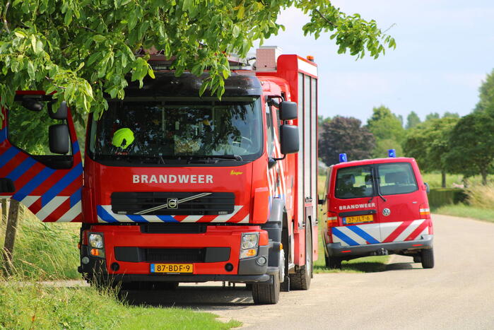 Brand in muur van schuur