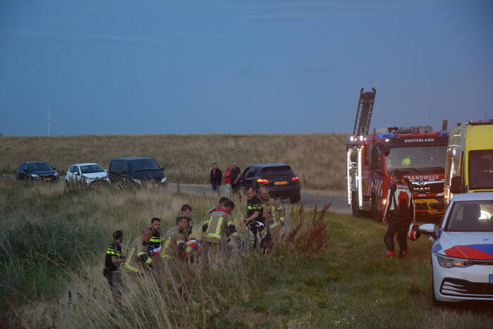 Motorrijders vliegen uit bocht