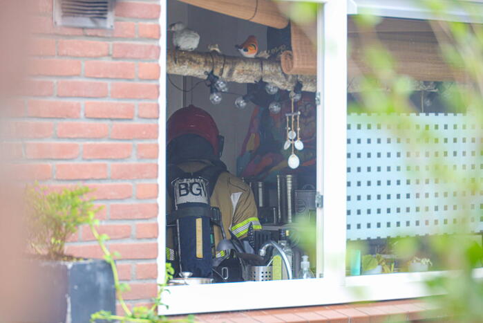 Brand slaat afzuiginstallatie in