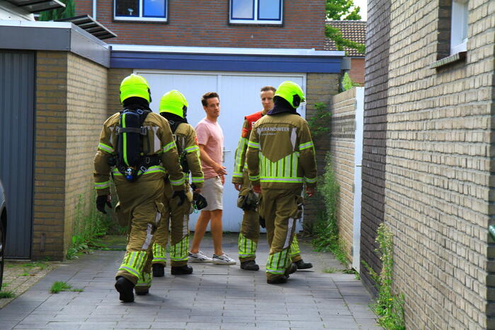 Brand in tuin van woning