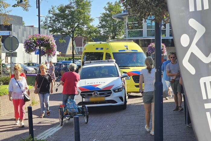 Persoon ten val met fiets