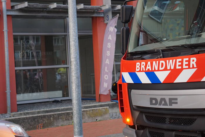 Kledingbak vat vlam in wassalon