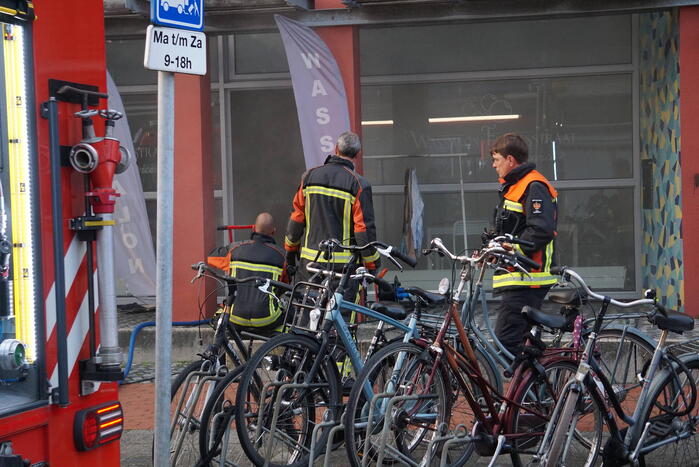 Kledingbak vat vlam in wassalon