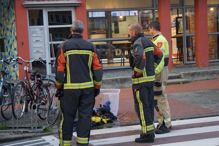 Kledingbak vat vlam in wassalon