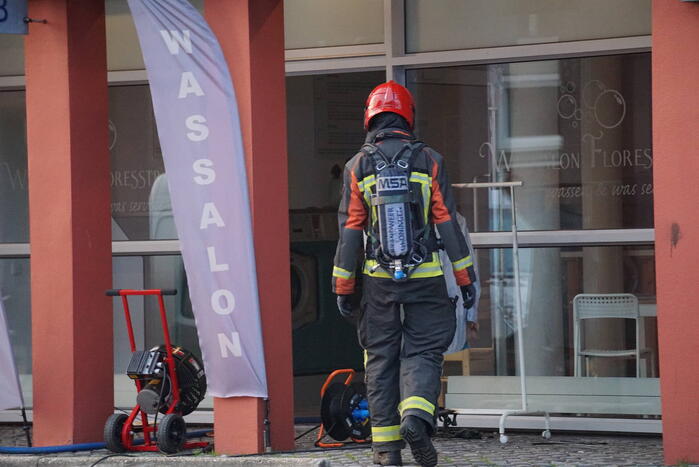 Kledingbak vat vlam in wassalon