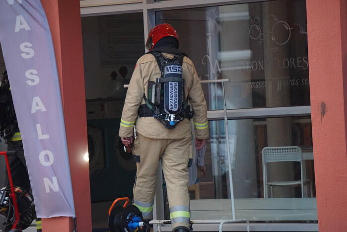 Kledingbak vat vlam in wassalon