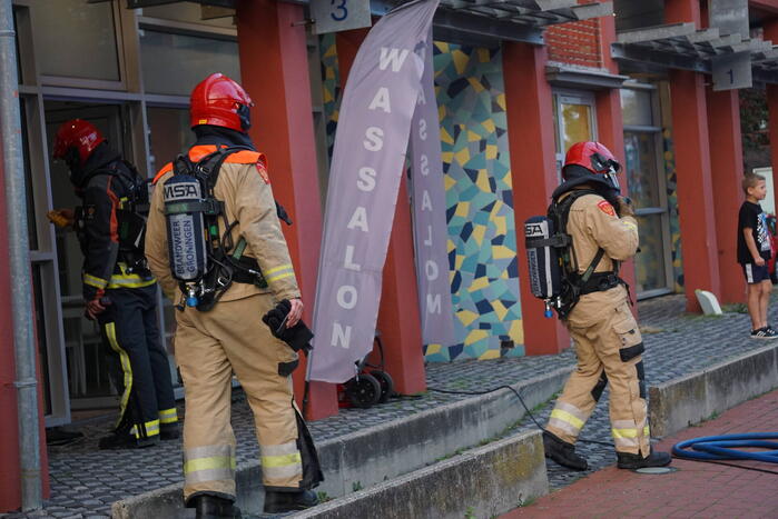 Kledingbak vat vlam in wassalon