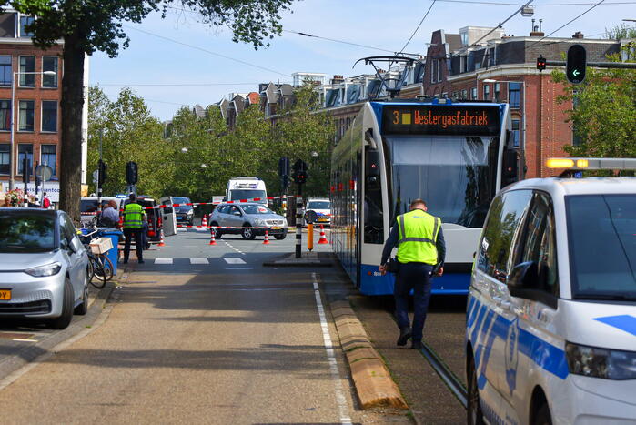 Vrouw met fiets aangereden door tram