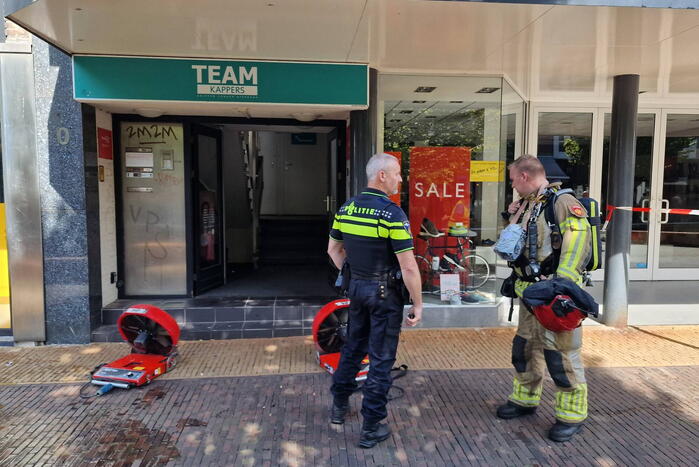 Telefoon vat vlam in kapsalon