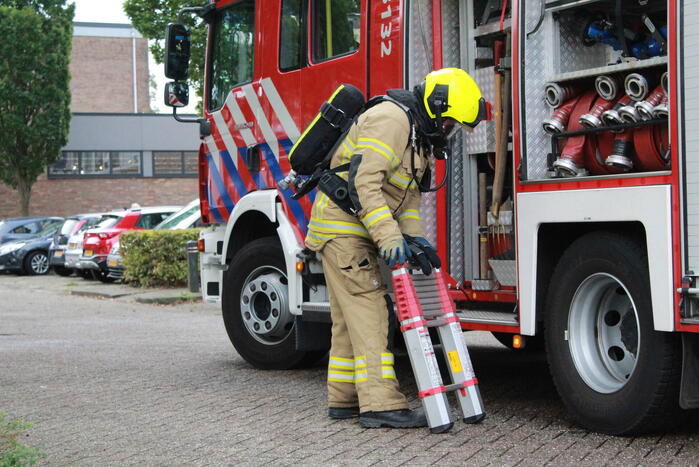 Rookontwikkeling in flat na brand