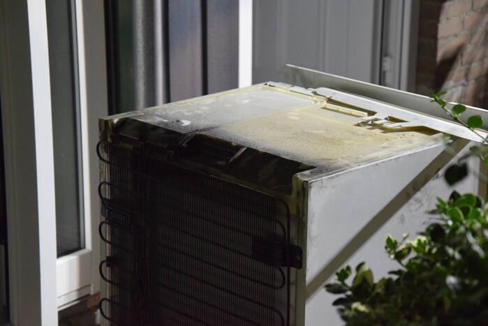 Kortsluiting koelkast veroorzaakt brand