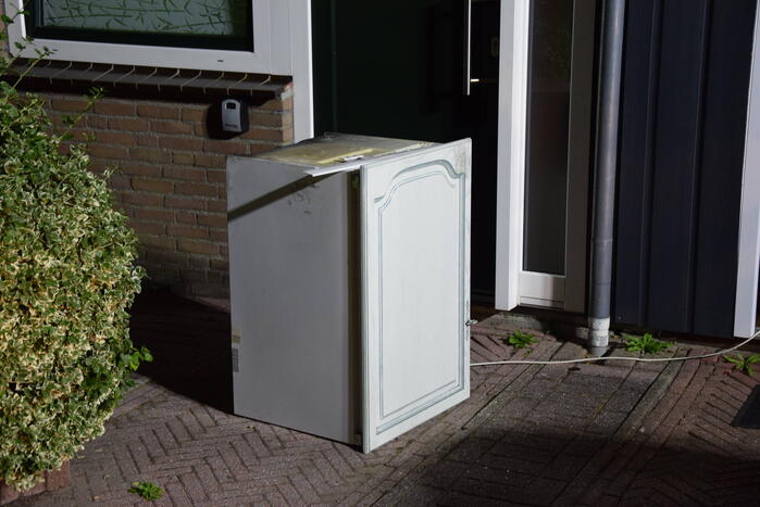 Kortsluiting koelkast veroorzaakt brand
