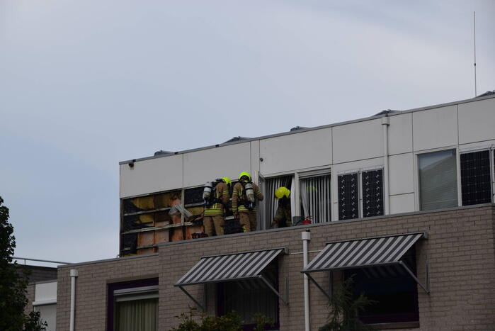 Dakdekkers veroorzaken brand op dak