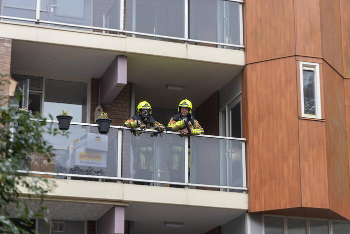 Persoon overleden bij woningbrand